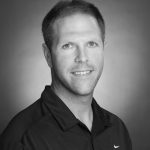 Tennis Instructor smiling