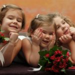 3 Cute flower girls at wedding