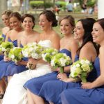 Laughing Bridal Party Holding Flowers Mystic Village