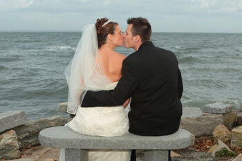 Romantic couple kissing on their wedding day